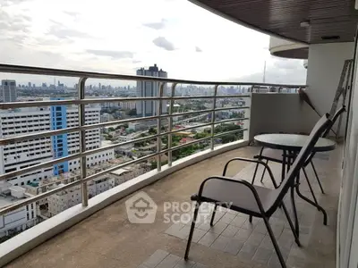 Spacious balcony with stunning city view, perfect for relaxation and enjoying the skyline.
