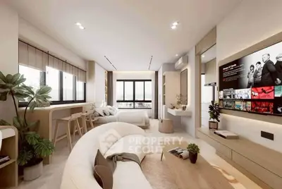 Modern open-plan living room with stylish decor and large windows offering natural light.