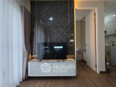Modern living room with sleek TV stand and elegant marble accent wall