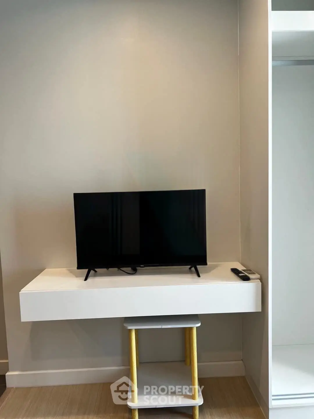 Modern living room with sleek TV setup and minimalist design