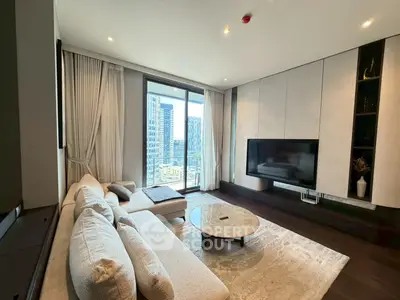 Luxurious modern living room with large windows and city view, featuring elegant furniture and stylish decor.