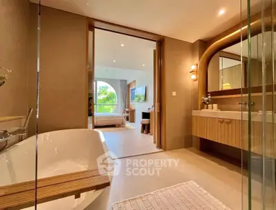Luxurious modern bathroom with freestanding tub and elegant wooden accents