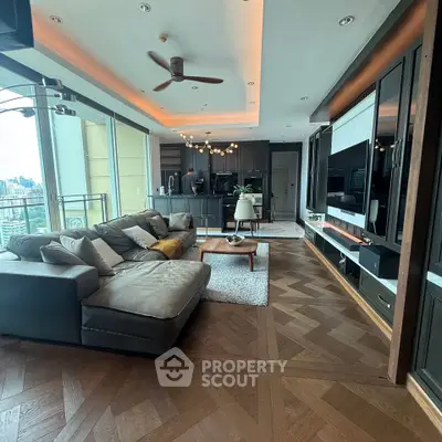 Luxurious open-plan living room with city view and modern kitchen, featuring elegant parquet flooring and stylish decor.