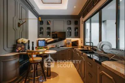 Luxurious modern kitchen with sleek cabinetry and elegant lighting