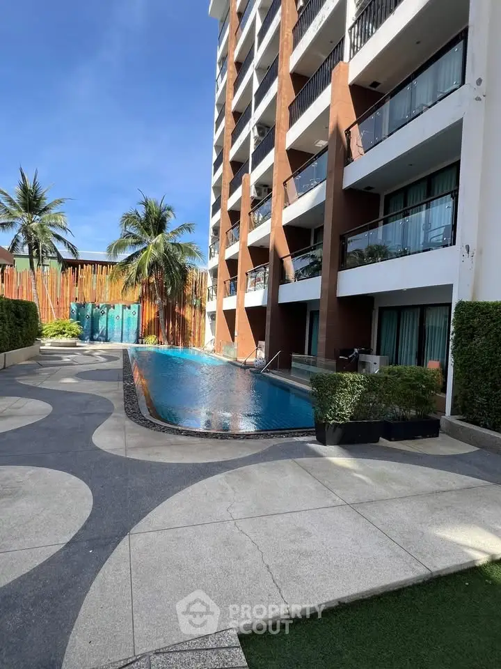 Luxurious condo with poolside view and modern architecture