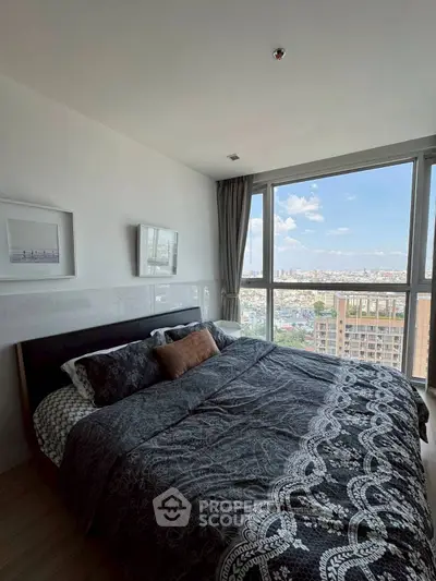 Luxurious bedroom with stunning city view and elegant decor