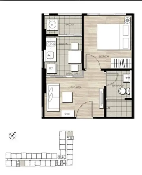 Modern apartment floor plan with bedroom, living area, kitchen, and bathroom layout.