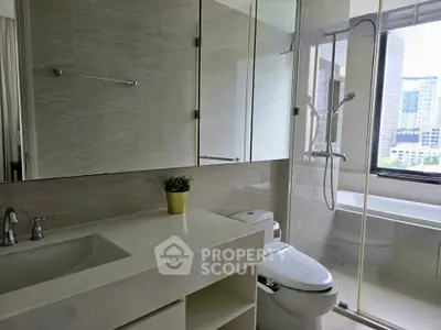 Modern bathroom with city view, featuring sleek fixtures and a bathtub for ultimate relaxation.