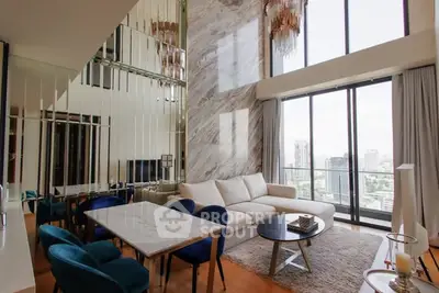 Luxurious high-rise living room with stunning city view and elegant decor.
