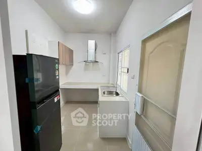 Modern kitchen with sleek appliances and ample counter space