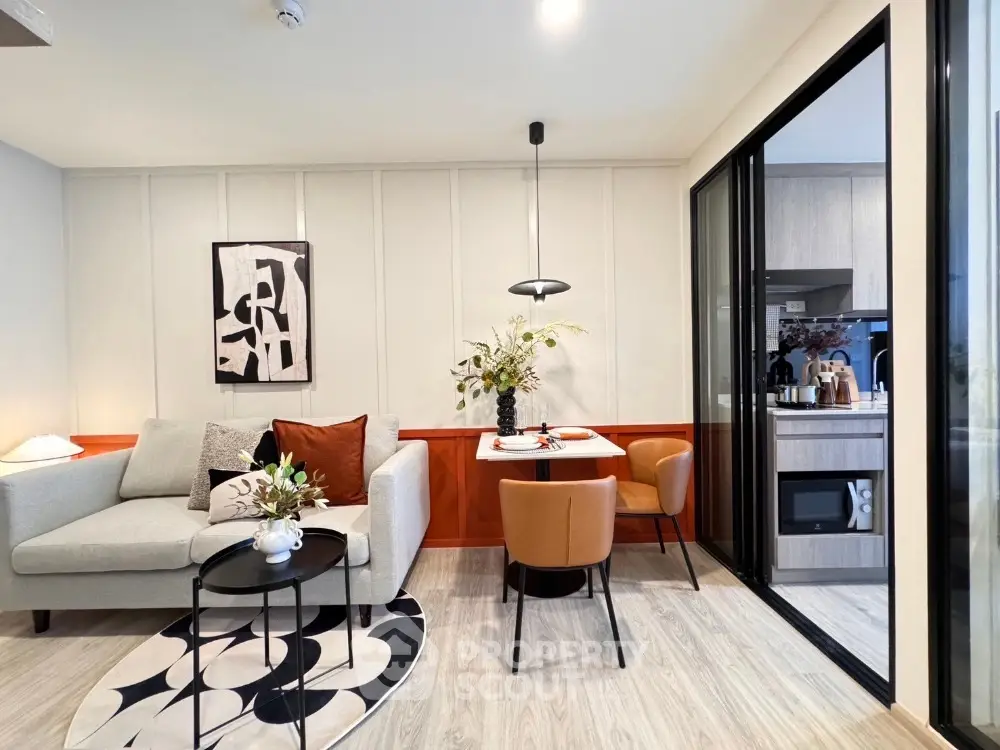 Modern living room with stylish decor and open kitchen layout