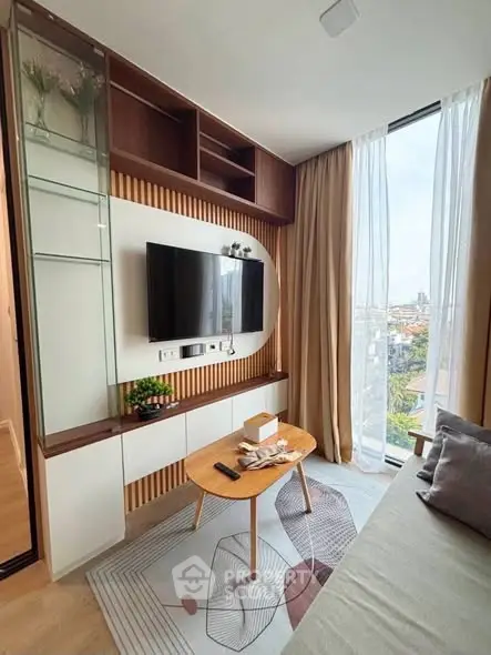 Modern living room with stylish decor and large window view