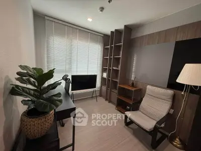 Modern study room with sleek furniture and natural light, perfect for productivity and comfort.