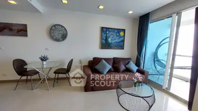 Modern living room with stylish decor and balcony access