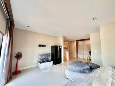 Spacious modern living room with sleek design and natural light