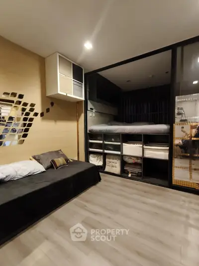 Modern bedroom with loft bed and sleek storage solutions