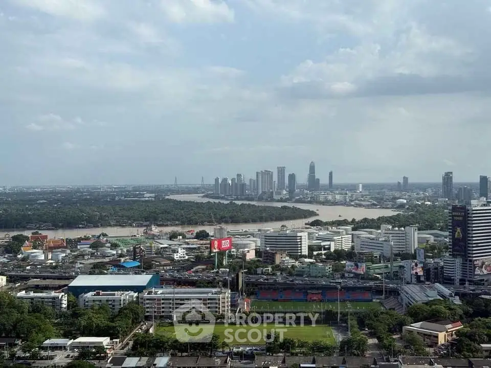 Stunning cityscape view with river and skyline, perfect for urban living enthusiasts.