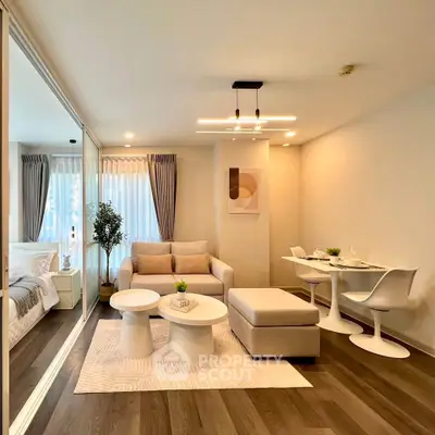 Modern open-plan living room with stylish furniture and elegant decor
