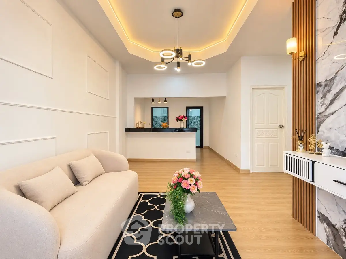 Modern living room with elegant lighting and stylish decor