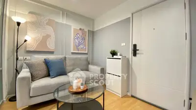 Modern living room with stylish decor and cozy seating area
