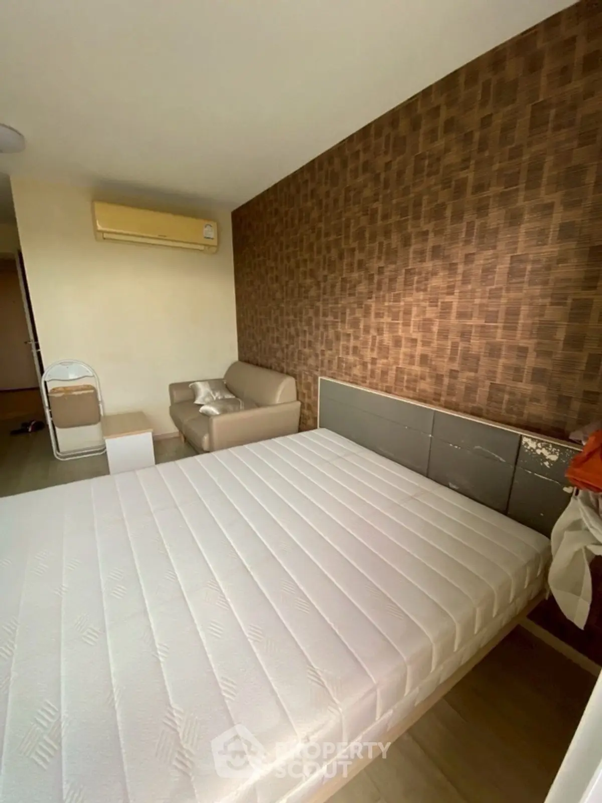 Cozy bedroom with modern decor and comfortable furnishings