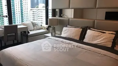 Luxurious bedroom with city view and modern decor