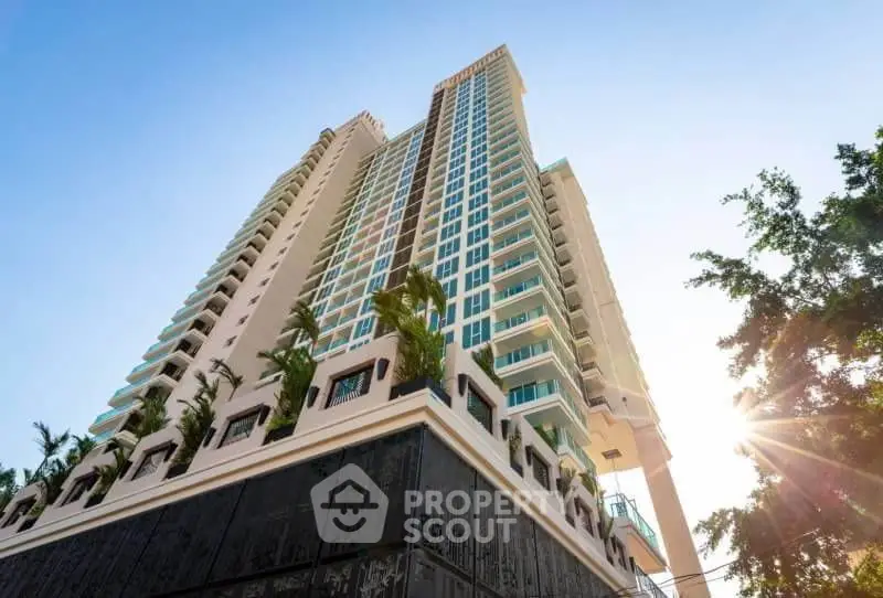 Stunning high-rise building with modern architecture and lush greenery