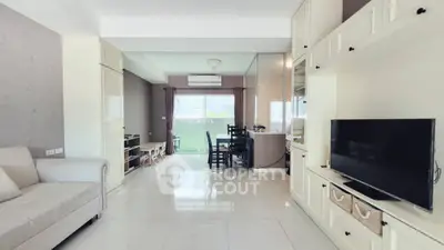 Spacious modern living room with sleek design and natural light