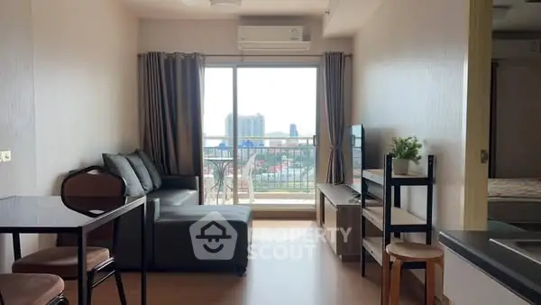 Modern living room with balcony view in urban apartment