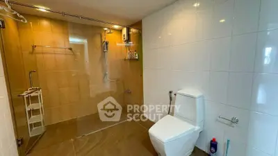 Spacious modern bathroom with walk-in shower and sleek design