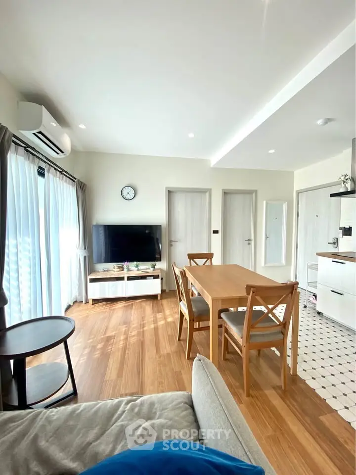 Bright modern living room with dining area and stylish decor