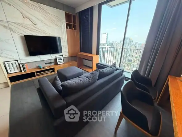 Modern living room with stunning city view and elegant furnishings