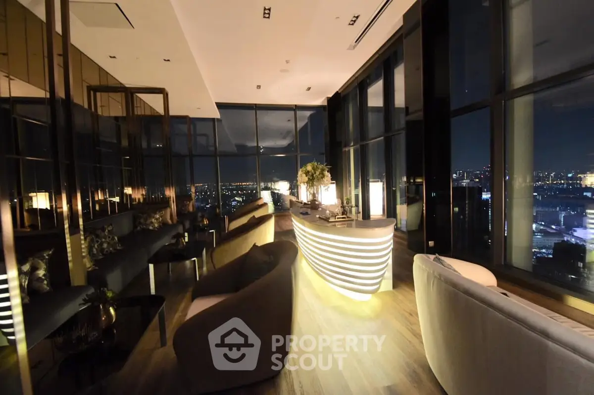 Luxurious high-rise lounge with panoramic city views and elegant modern decor.