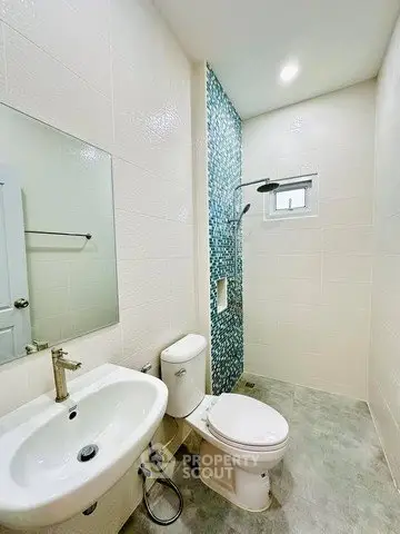 Modern bathroom with sleek fixtures and stylish tile design