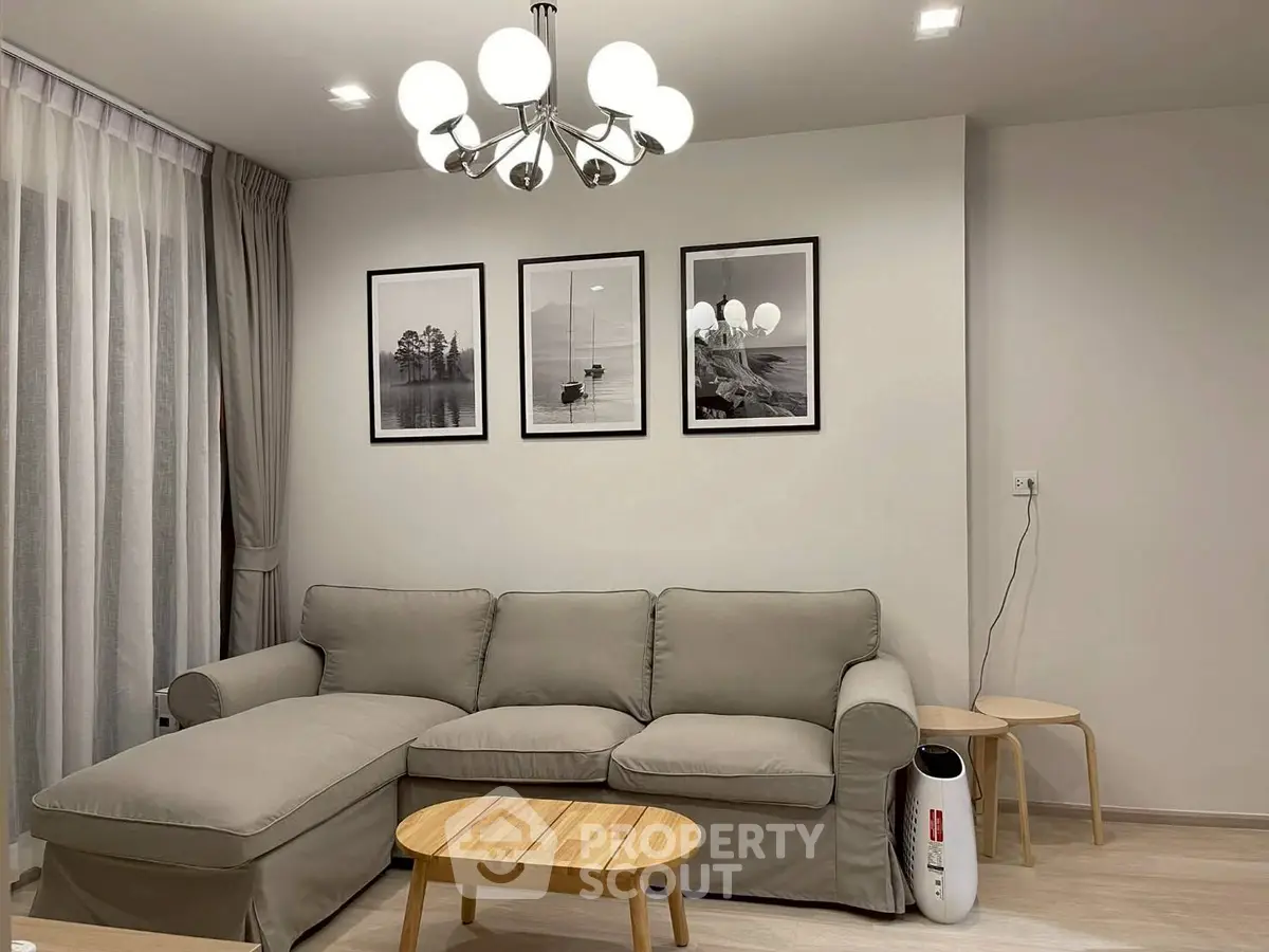 Modern living room with stylish sofa and elegant lighting