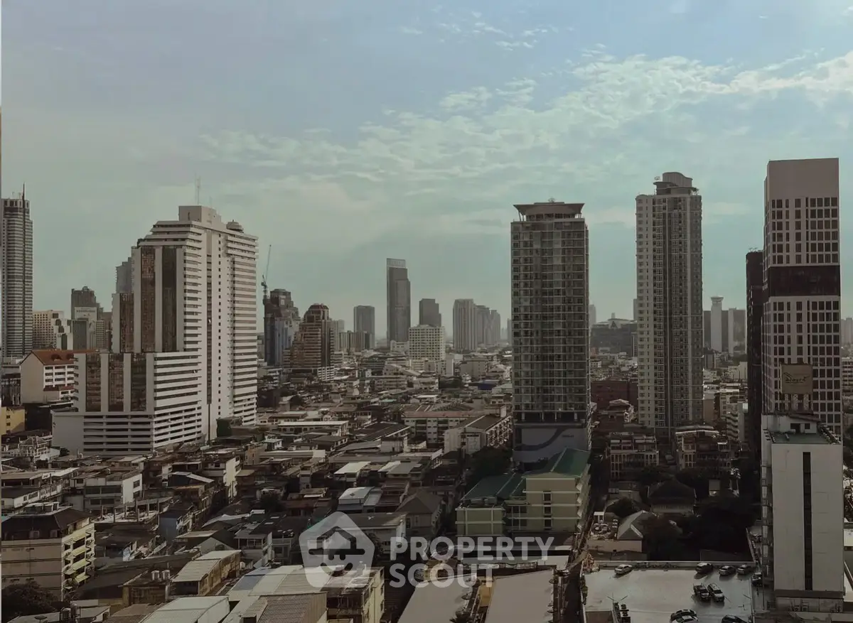 Stunning cityscape view showcasing modern high-rise buildings under a clear sky.