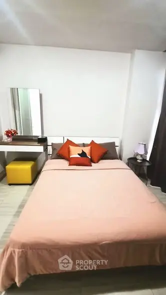 Cozy bedroom with stylish decor and modern furnishings