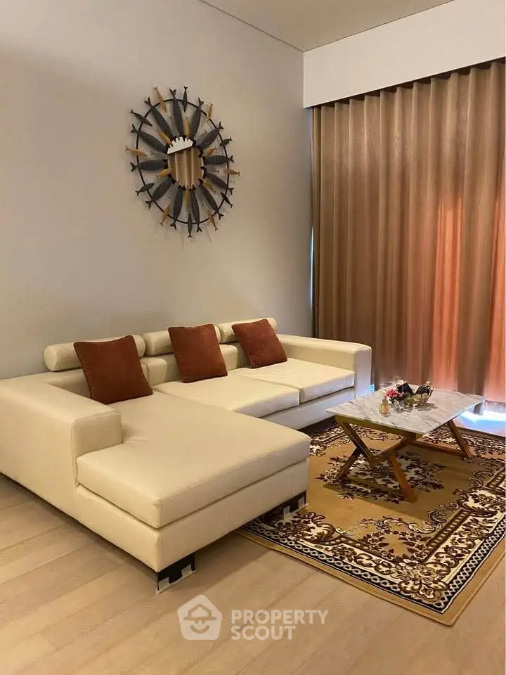 Elegant living room with modern white sofa and stylish decor