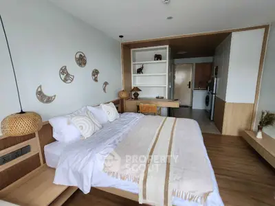 Modern bedroom with cozy decor and wooden accents, featuring a comfortable bed and stylish shelving.