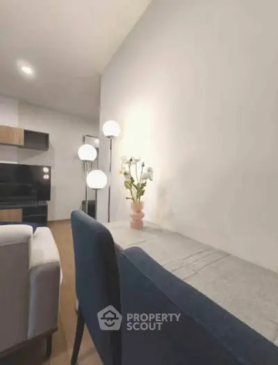 Modern living room with stylish furniture and ambient lighting