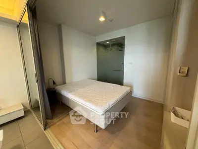 Modern bedroom with minimalist design and glass partition