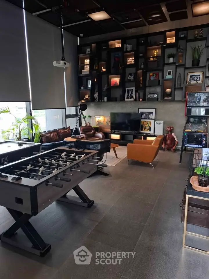 Stylish living room with foosball table and modern decor