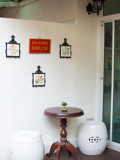 Charming patio with elegant decor and seating, perfect for relaxation and outdoor enjoyment.