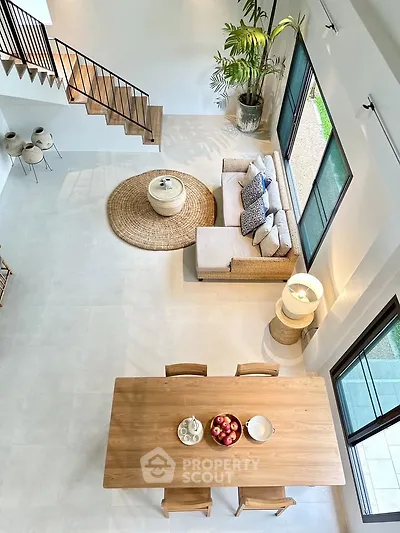 Spacious modern living room with elegant decor and natural light