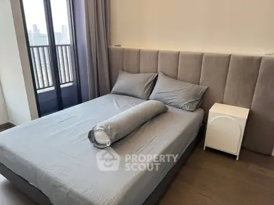 Modern bedroom with city view and stylish decor