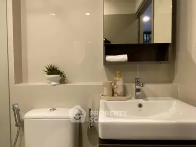 Modern bathroom with sleek fixtures and elegant decor