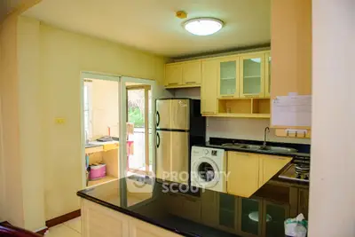Spacious kitchen with modern appliances and open layout