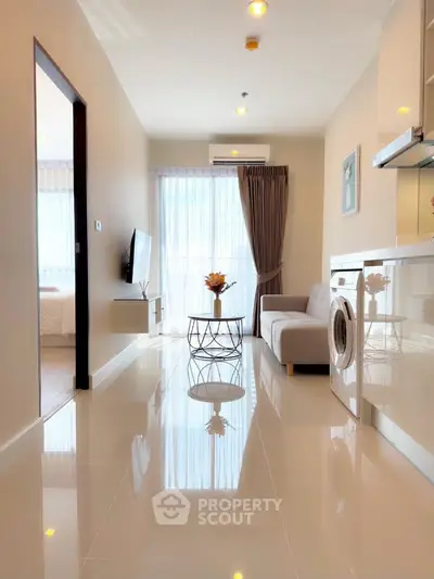 Modern apartment interior with sleek kitchen and cozy living area