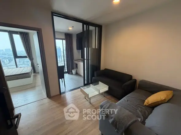 Modern apartment interior with cozy living room and bedroom view