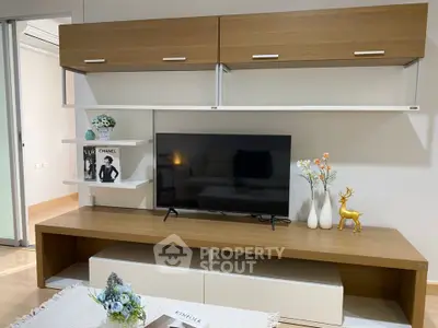 Modern living room with stylish TV unit and decorative elements